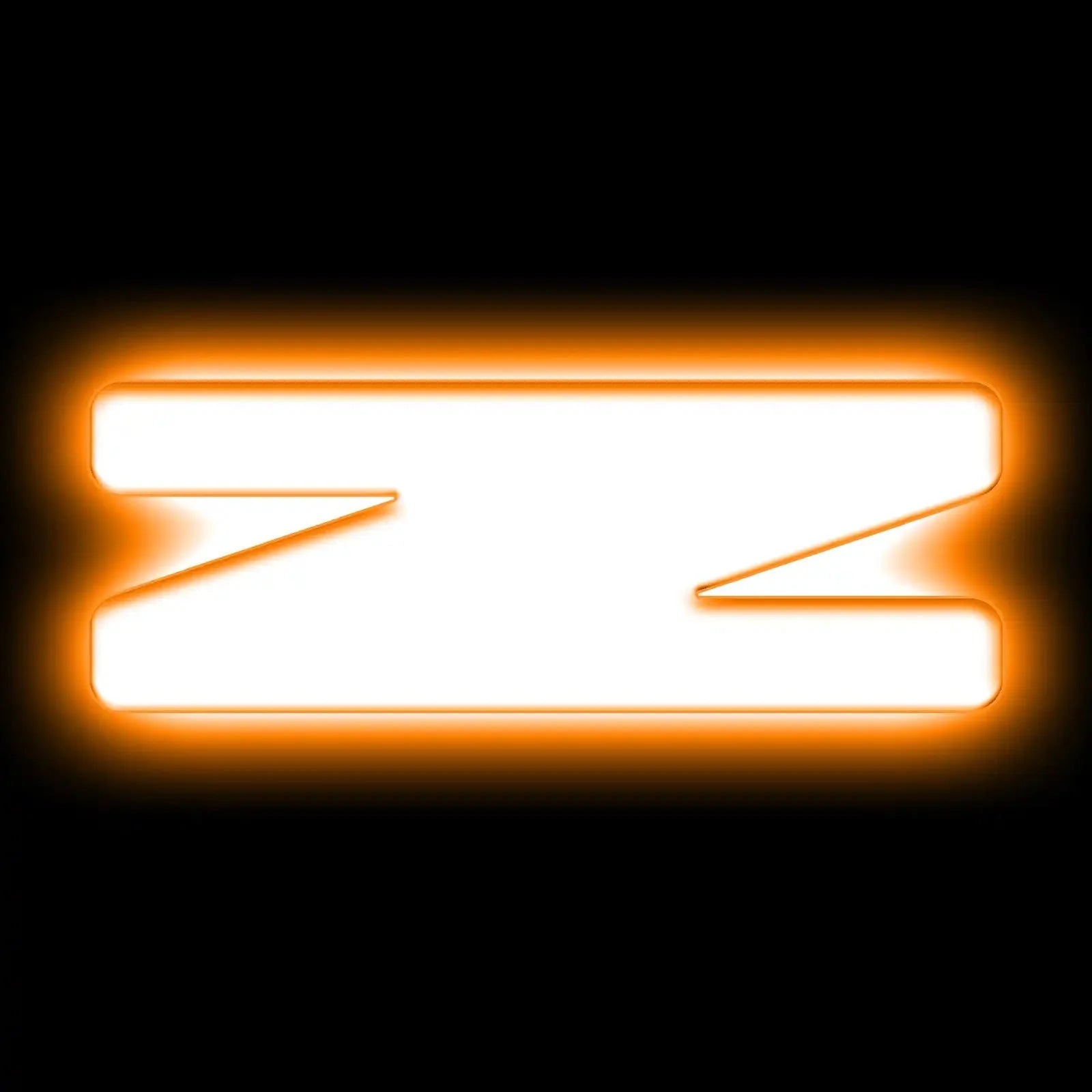 White Z-shaped light-up emblem with orange LED glow on black background, vehicle accessory