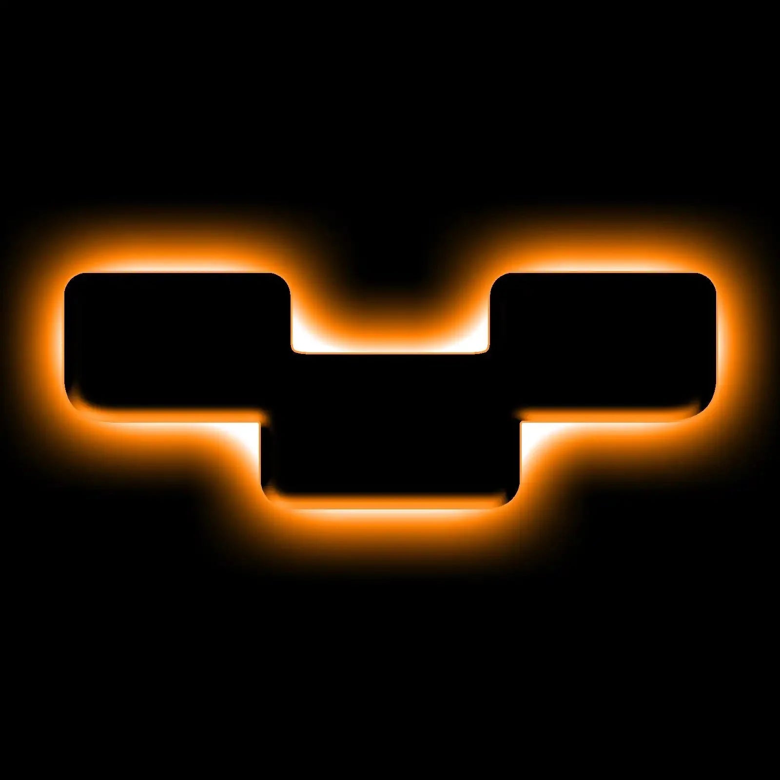 Amber backlit grille marker light for Toyota vehicle on black background