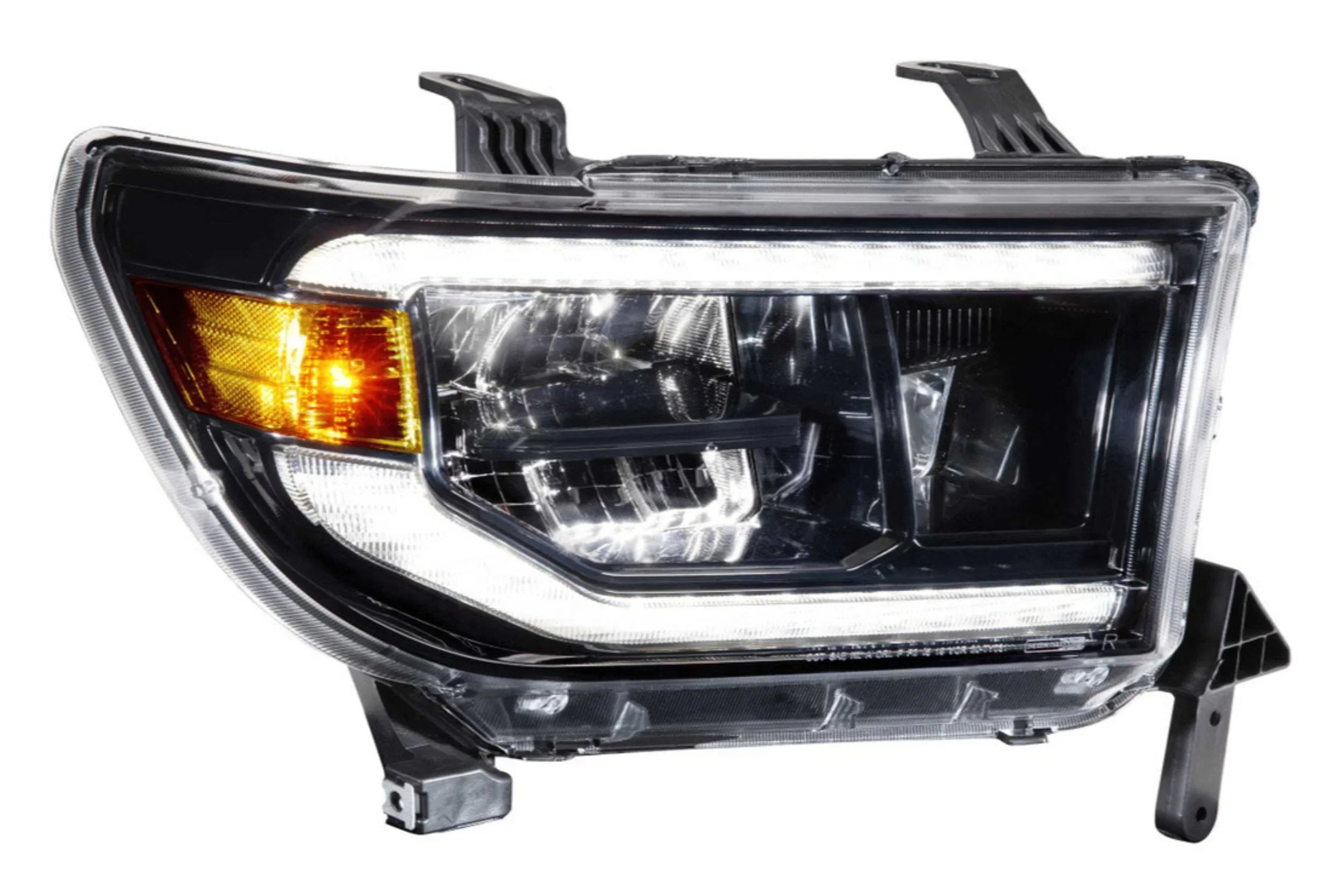 Toyota Tundra XB LED headlight assembly with clear lens and amber reflector