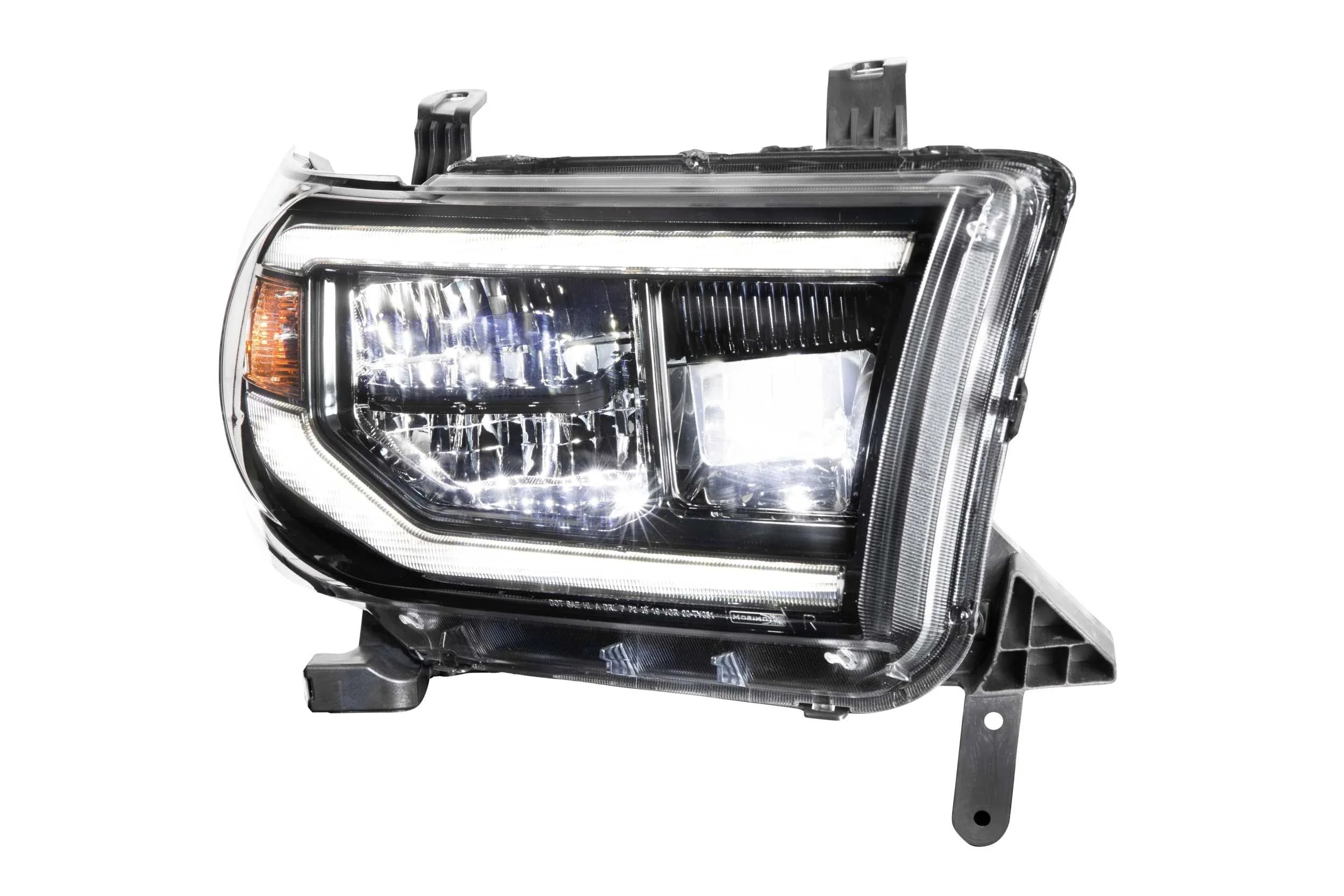 Toyota Tundra XB LED headlight with DRL bar and turn signal, isolated on white