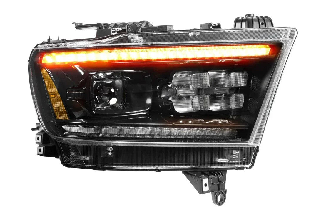 RAM 1500 LED headlight assembly with amber running light and black housing, front view