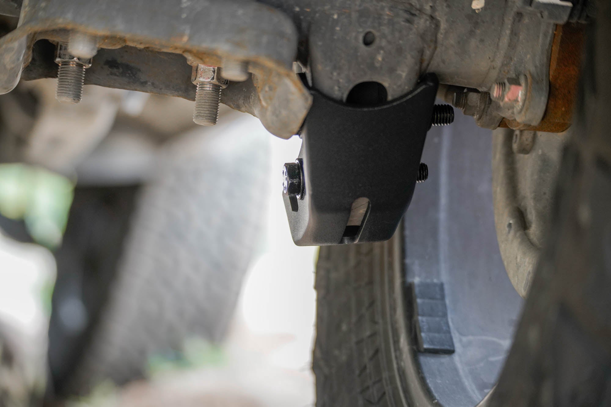 3rd-gen-Toyota-Tacoma-Rear-Shock-Skid-Plates-Installed-08 - NVMOS
