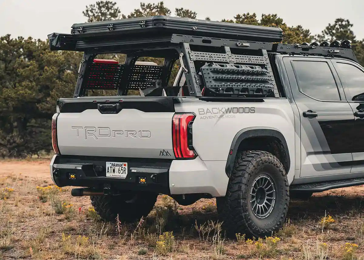 White Toyota Tundra TRD Pro Overland Truck Build with Backwoods Adventure Mods 2022+ 3rd Gen Tundra High Clearance Rear Bumper installed for off roading