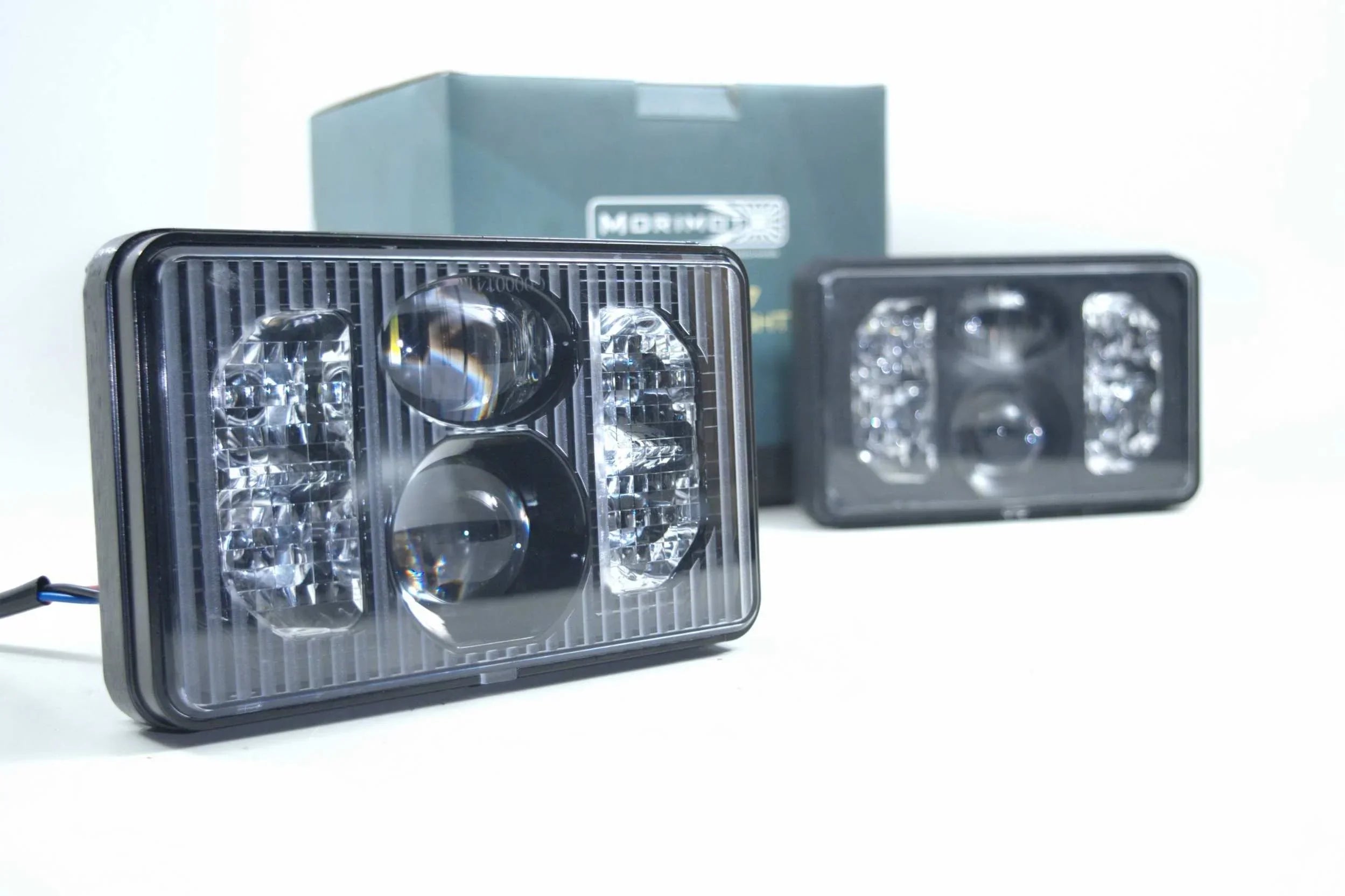 Rectangular bi-LED 4x6 headlight assemblies with projector lenses on white background