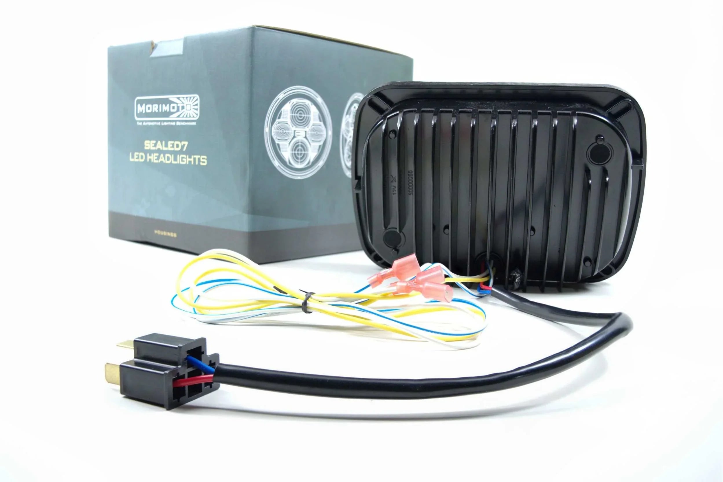 Rectangular LED headlight housing with wiring harness and box for vehicle installation
