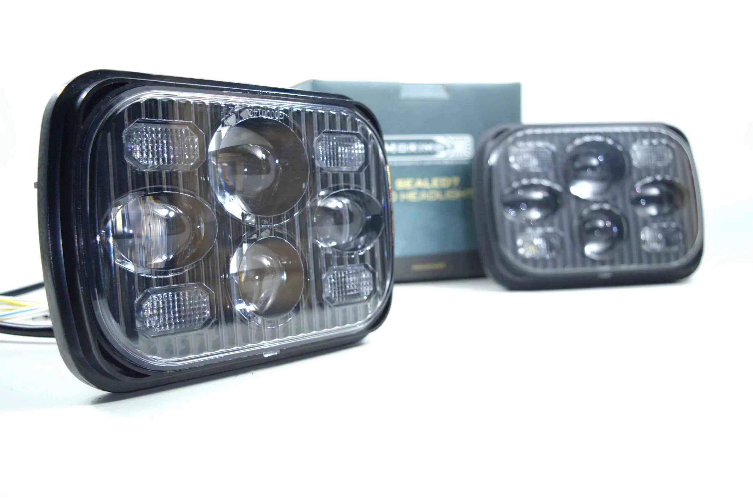 Rectangular bi-LED 5x7 sealed headlight for off-road vehicles on white background