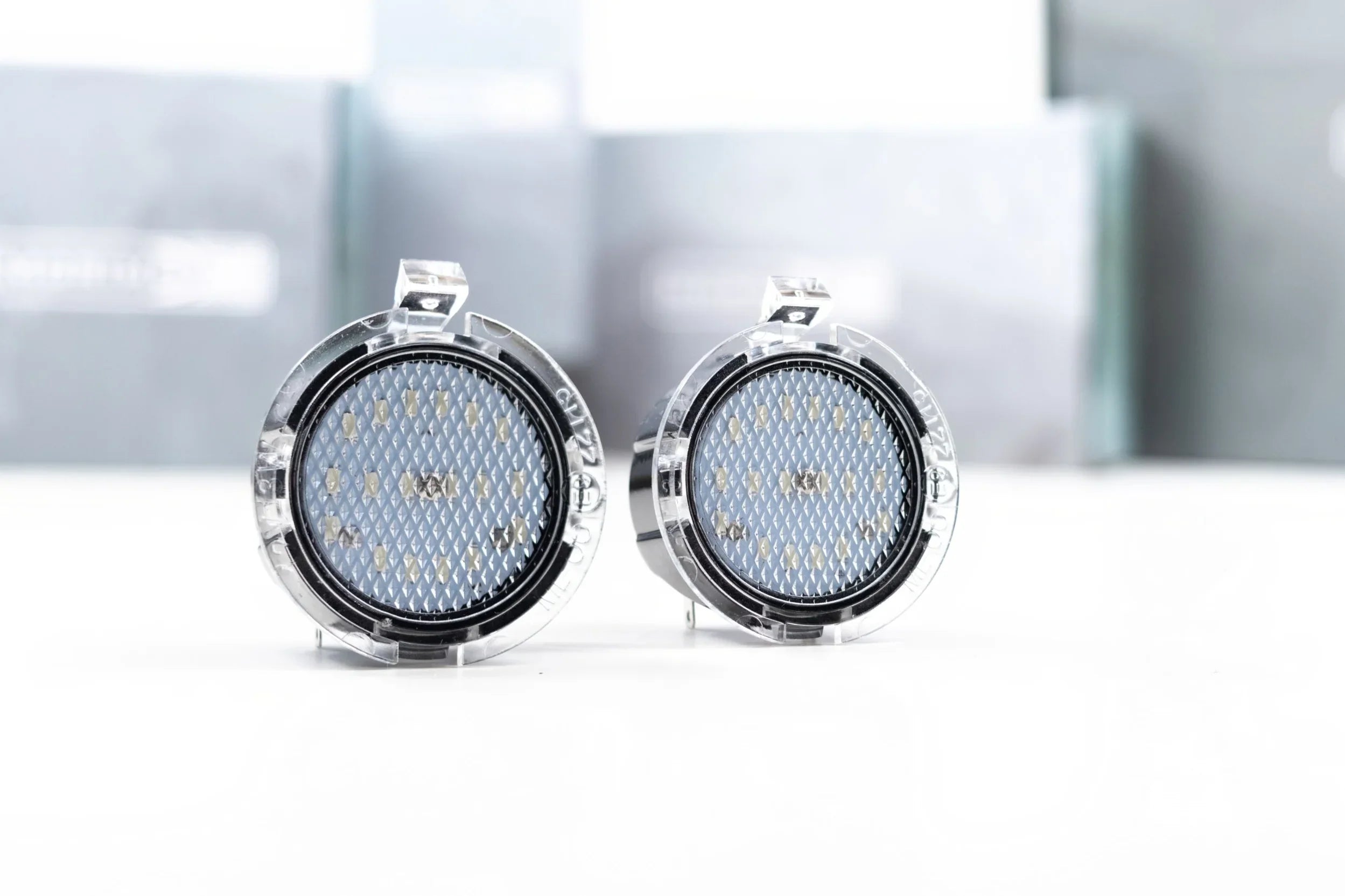 Pair of round LED license plate lights for Toyota 4Runner and Sequoia, silver housing