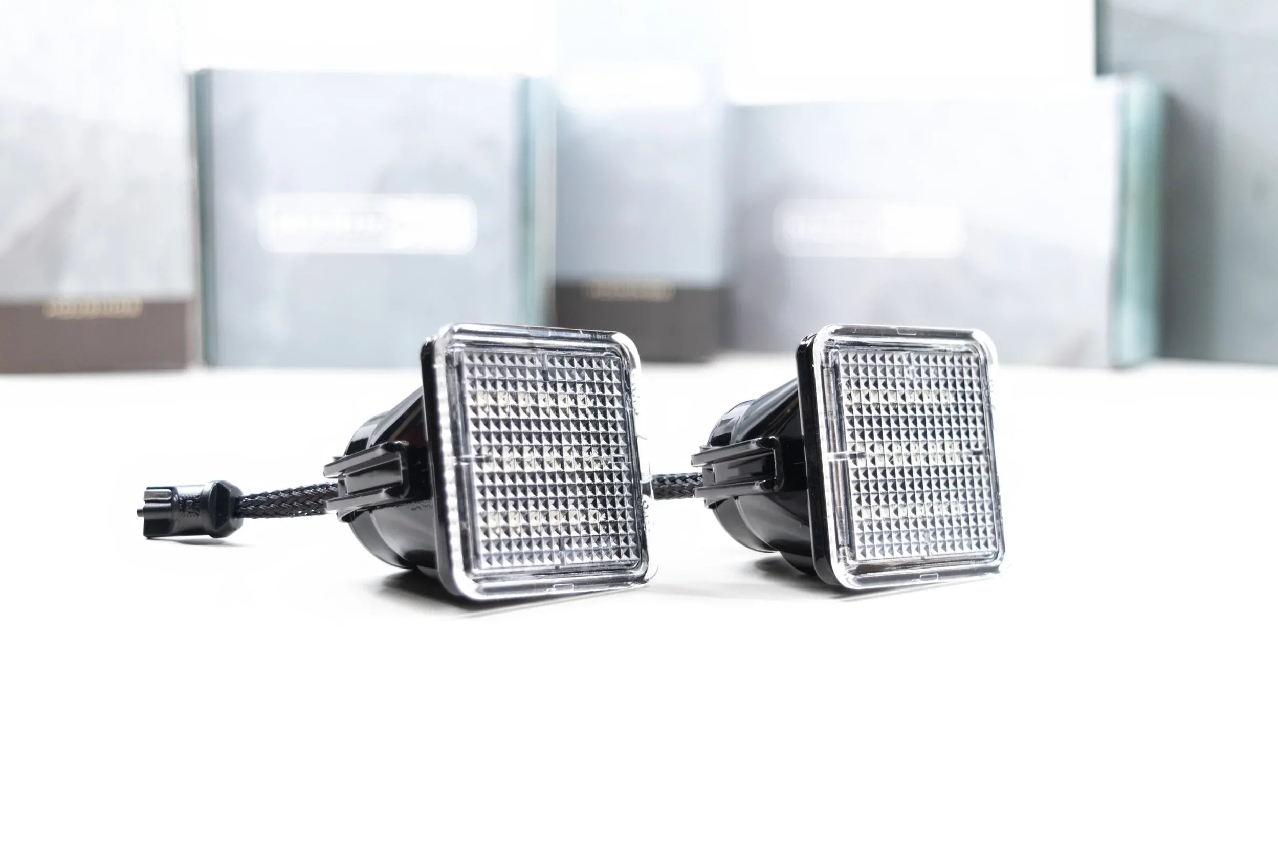 LED license plate lights for Toyota Tacoma truck, pair on white background
