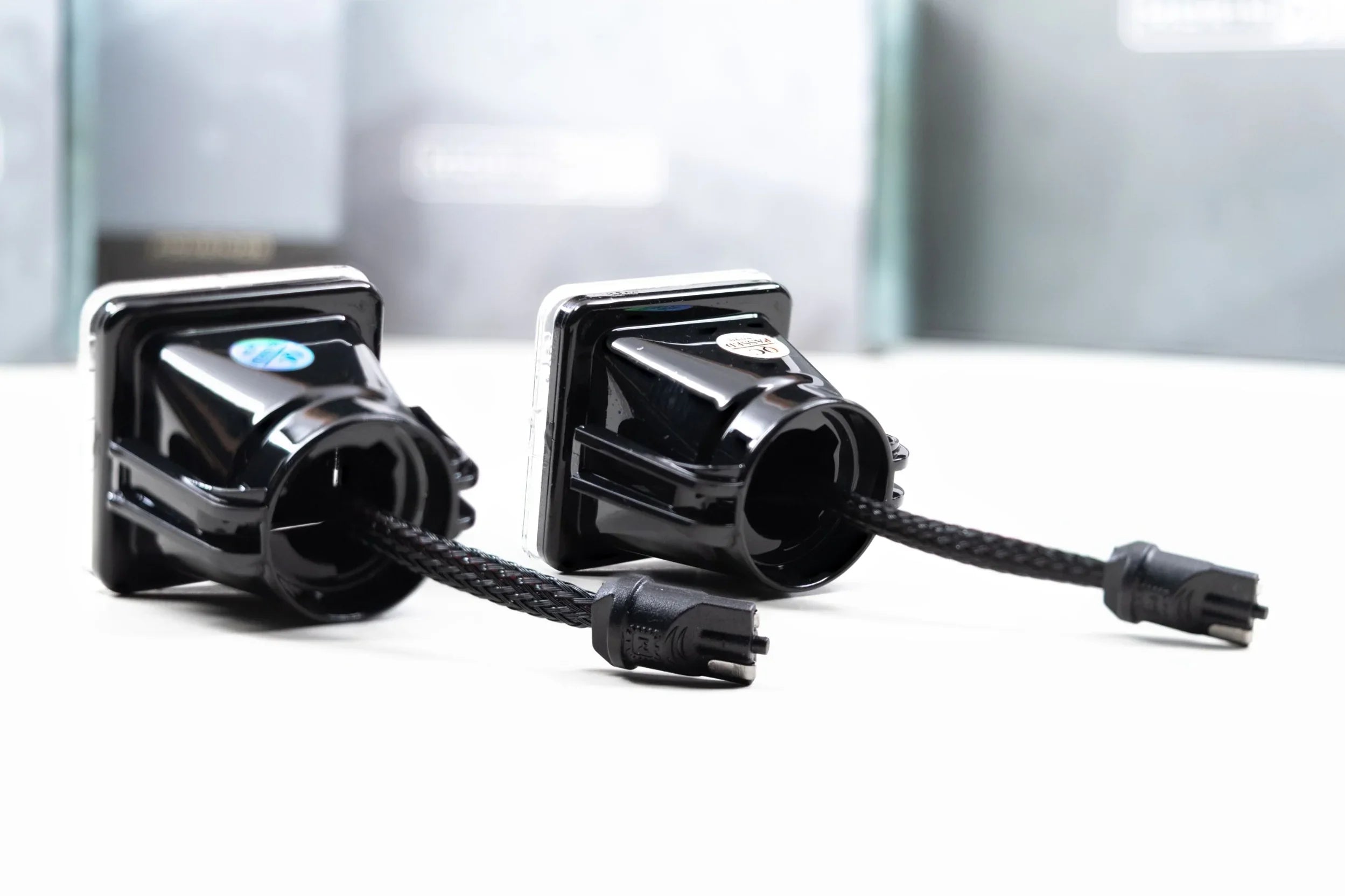 Pair of black LED license plate lights with wiring for Toyota Tacoma vehicle accessories
