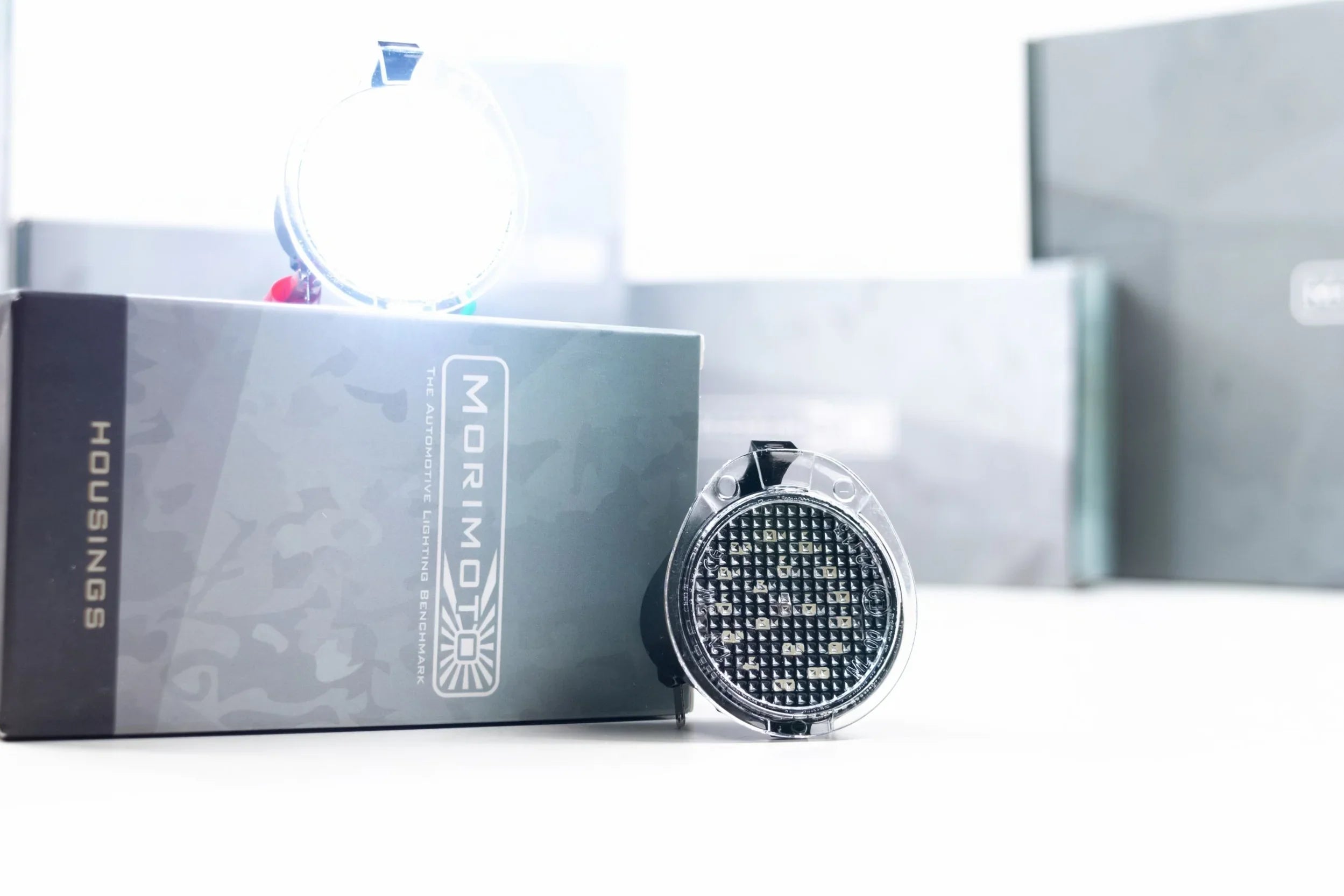 Morimoto round LED mirror lights for Toyota Tundra on product packaging