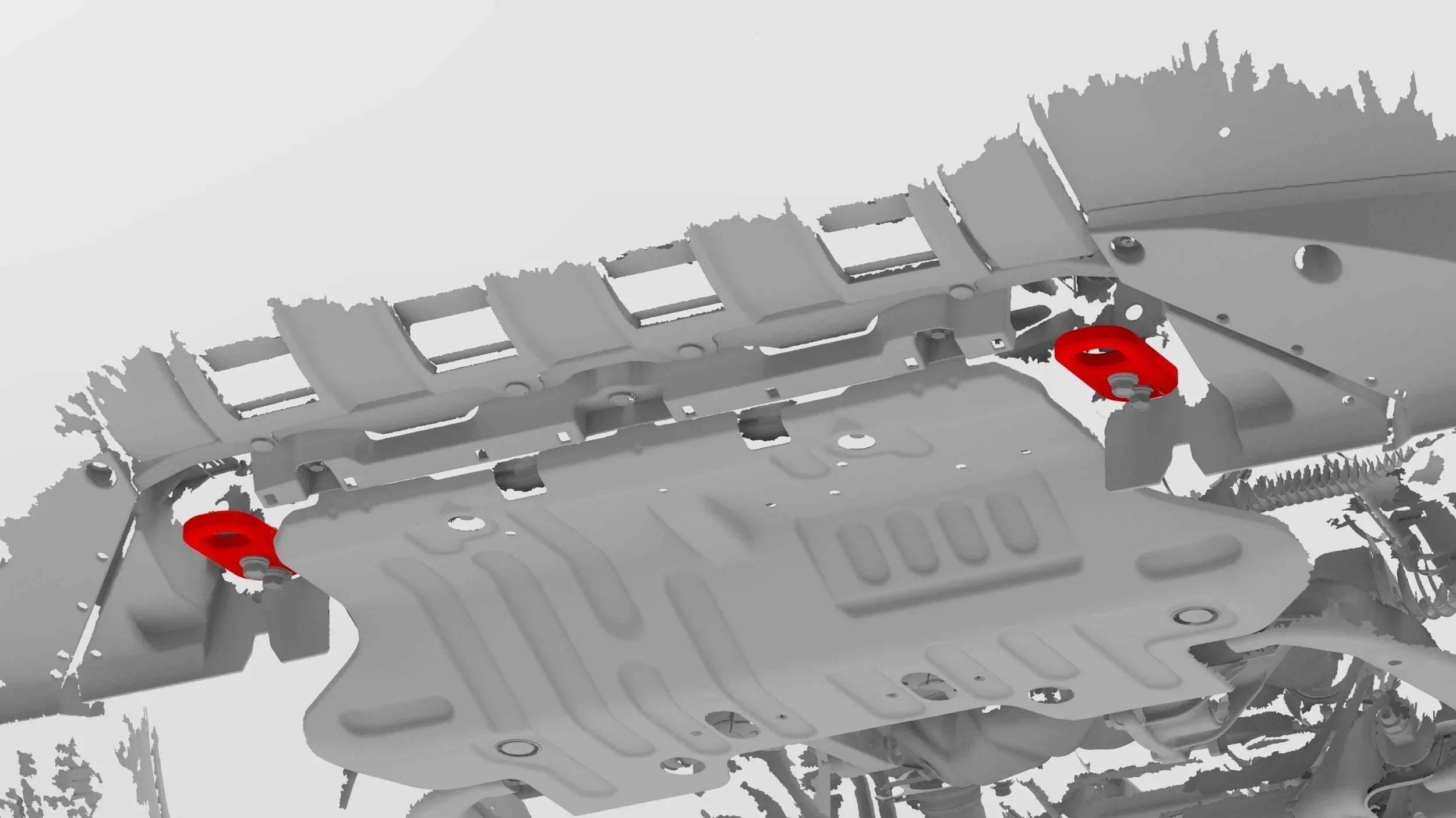 Underbody view of off-road vehicle skid plate with red recovery points installed