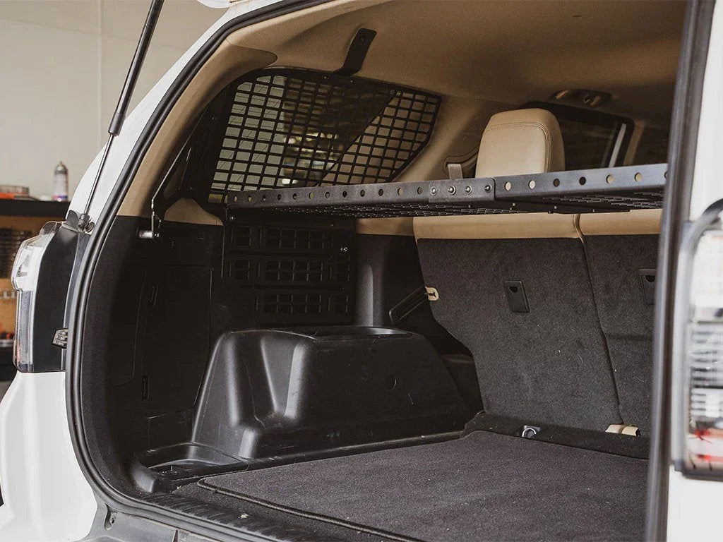 Toyota 4Runner rear cargo area with MOLLE storage panel and mounting rack