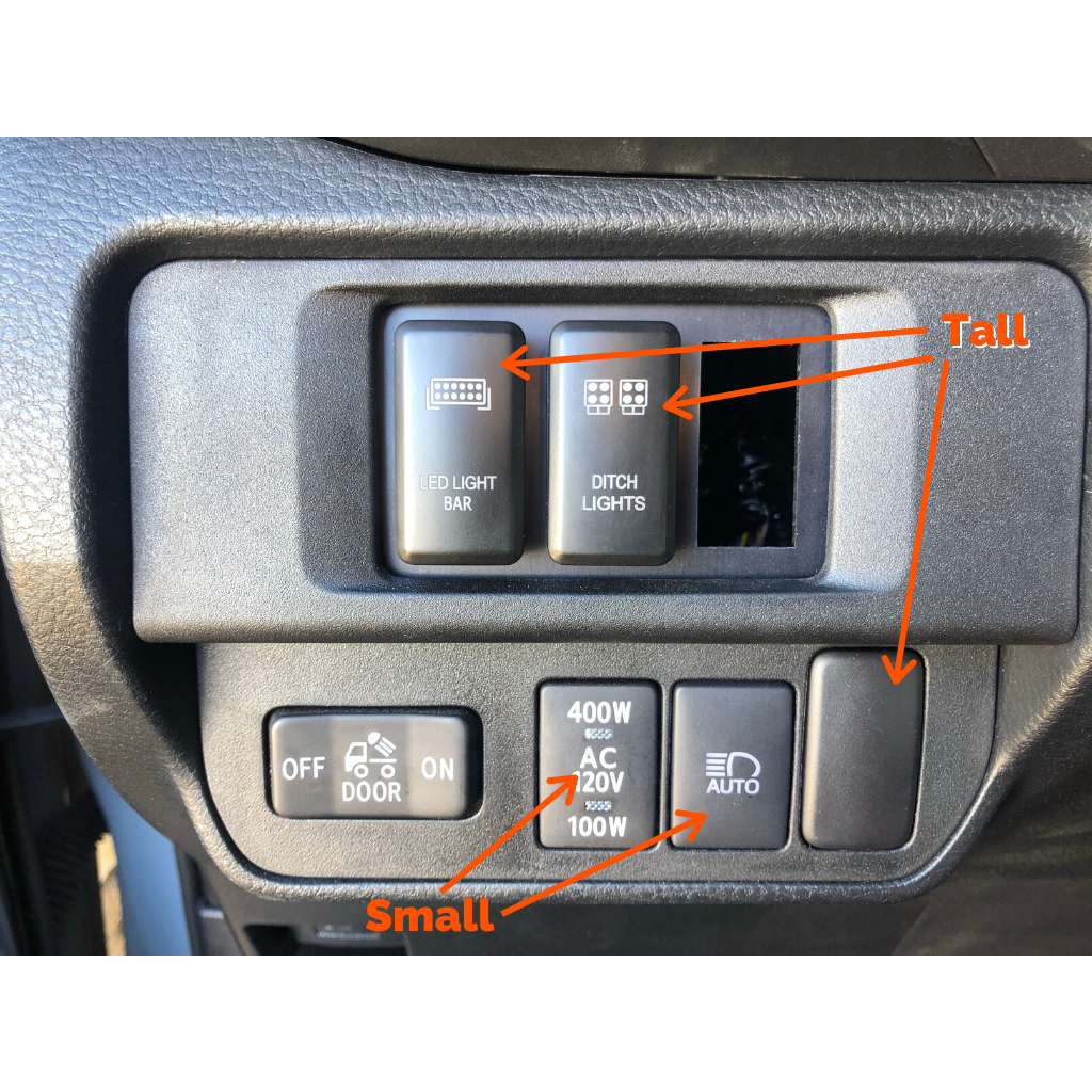 Toyota dashboard switch panel showing LED light bar, ditch lights, power, and door switches with tall and small labels.