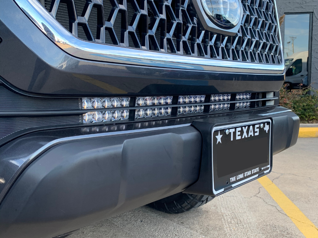 LED light bar installed on front bumper of off-road vehicle with Texas license plate