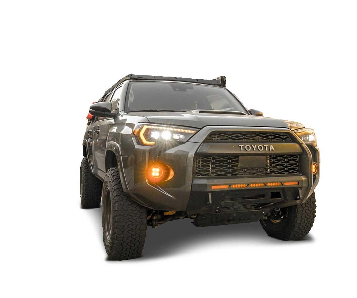Lifted Toyota 4Runner with off-road bumper, LED lights, and rugged overland accessories