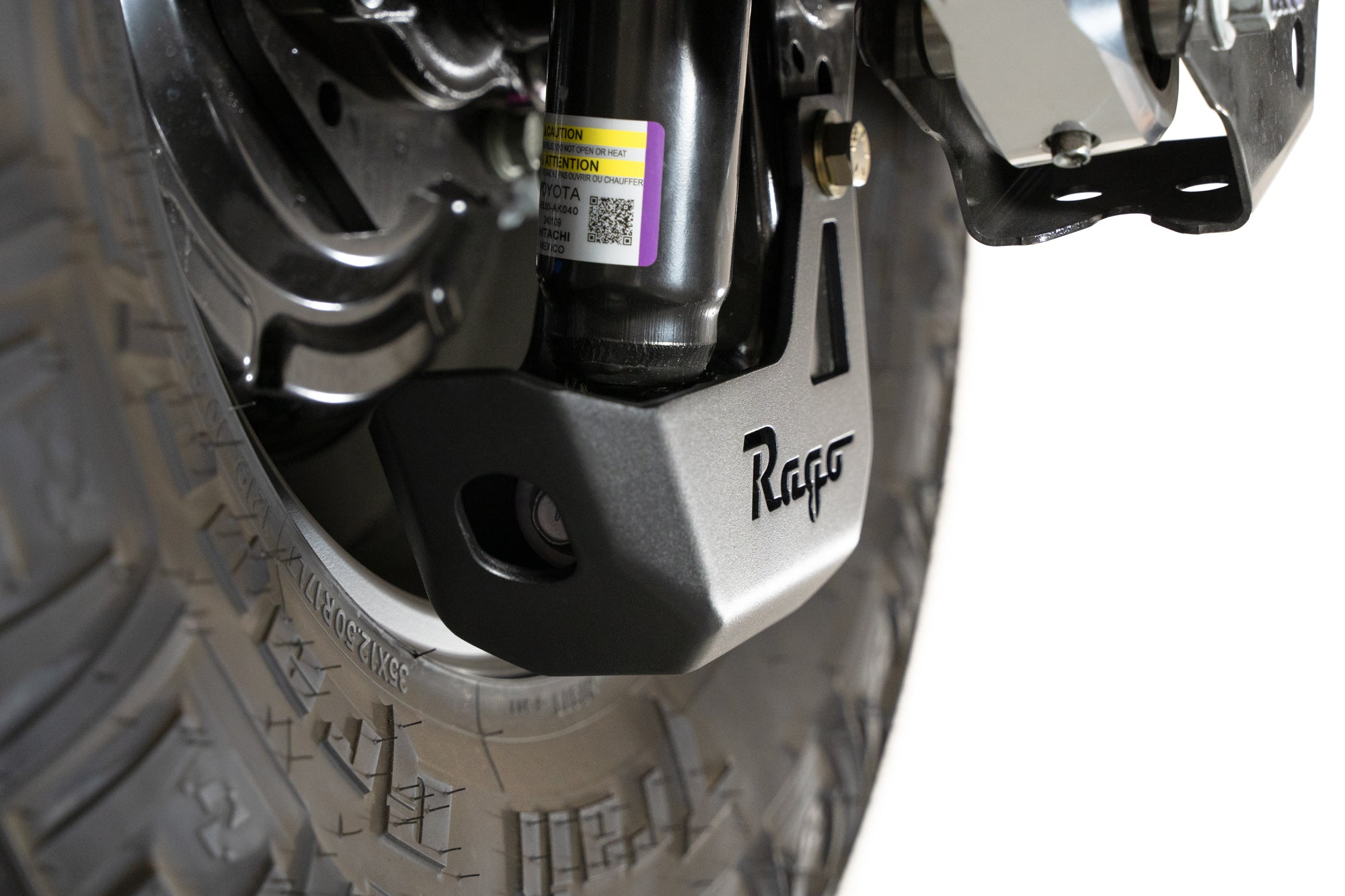 4th-gen-Toyota-Tacoma-Rear-Shock-Guards-Installed-6 - NVMOS