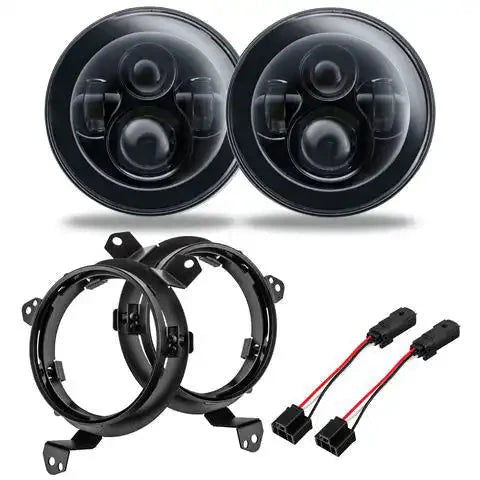 Round LED headlight set with mounting brackets and wiring harness for off-road vehicles