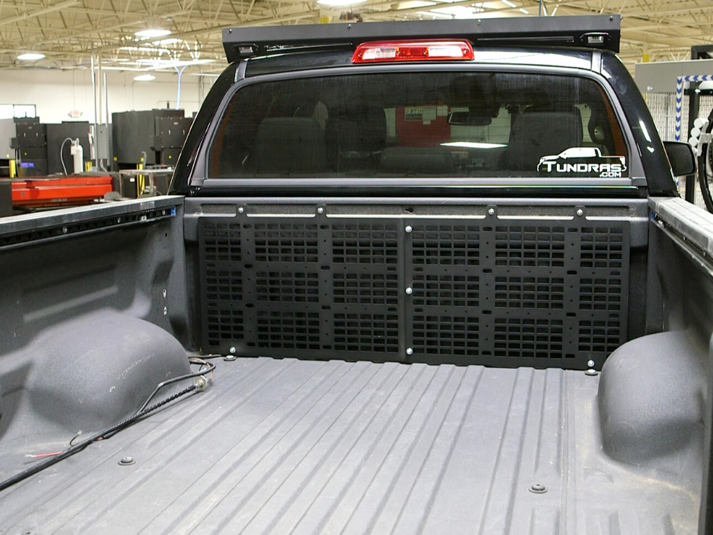 Truck bed with modular cargo panel and rack system installed for Toyota Tundra