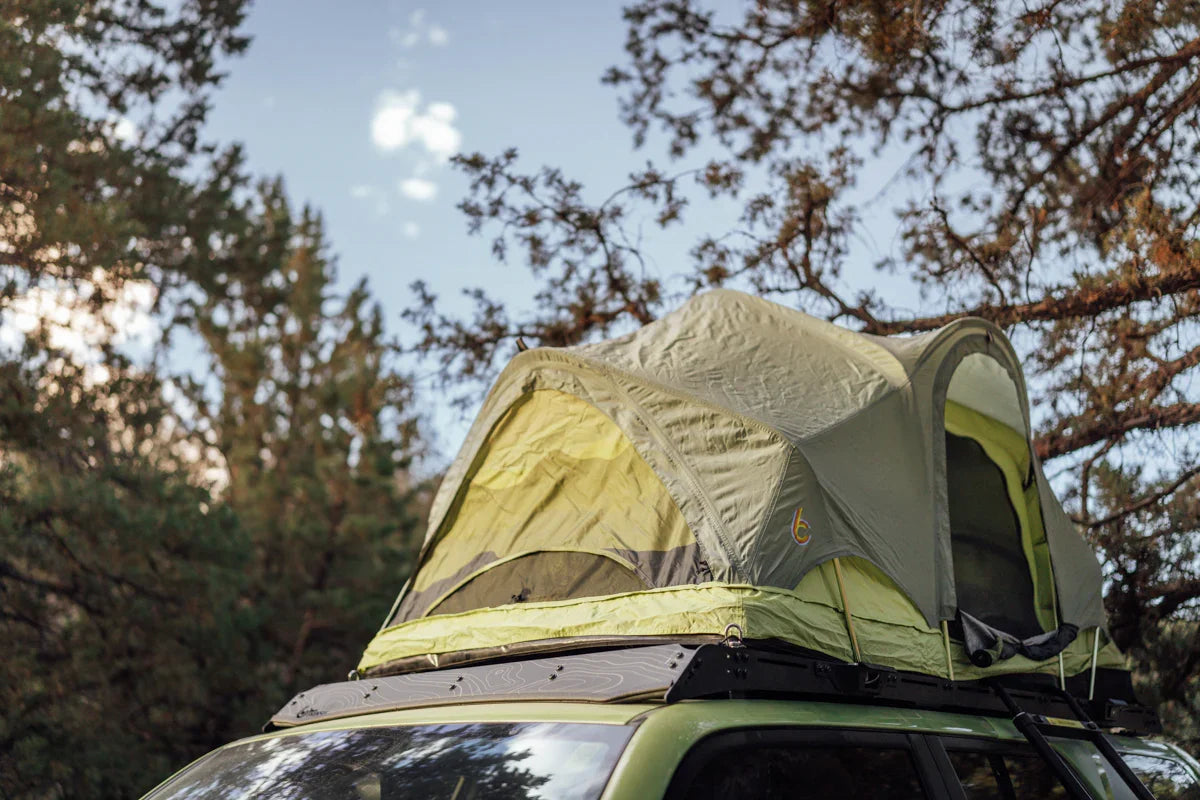 Rooftop tent mounted on Toyota 4Runner for overlanding and camping outdoors