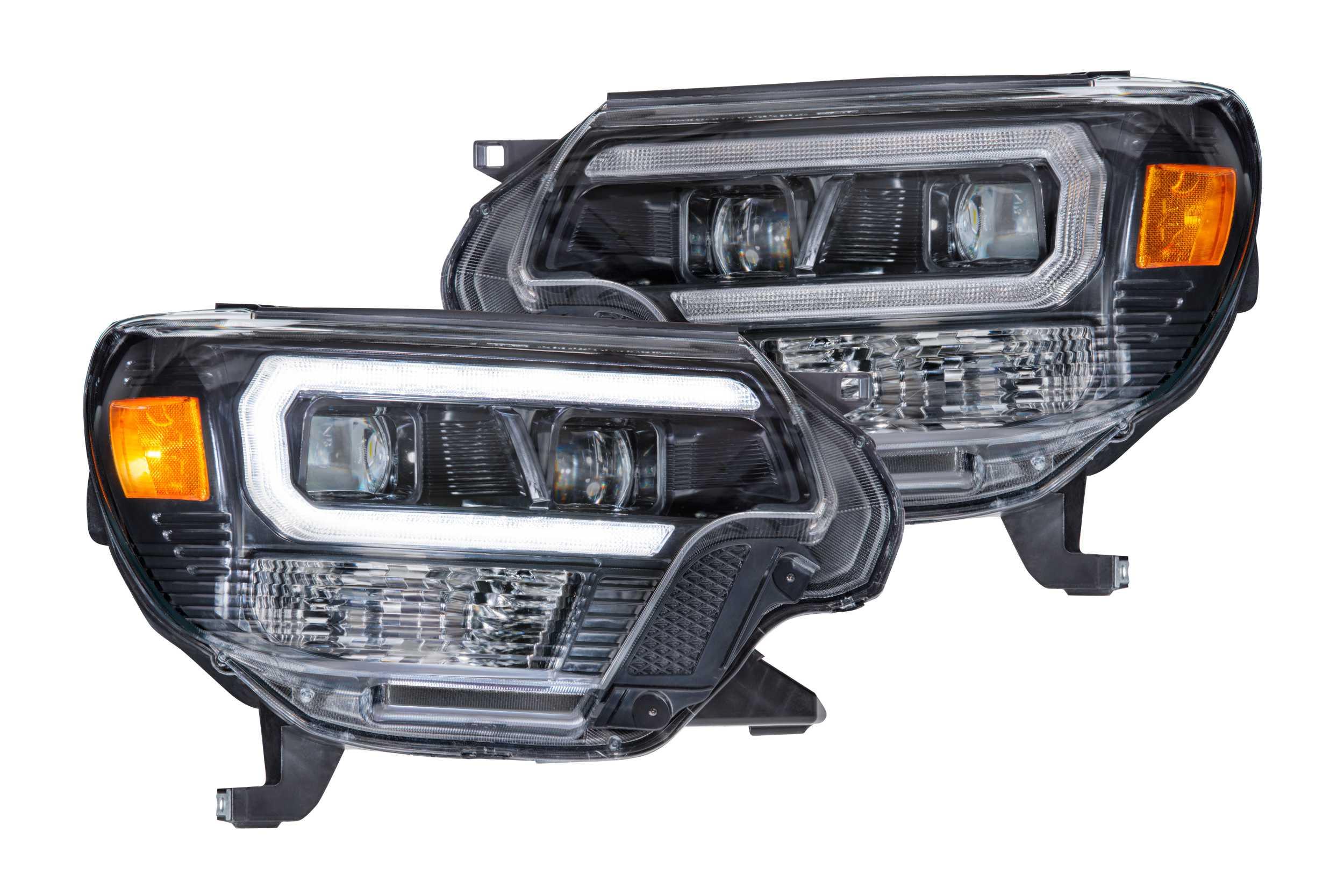 Pair of LED hybrid headlights for Toyota Tacoma with clear lens and amber reflector