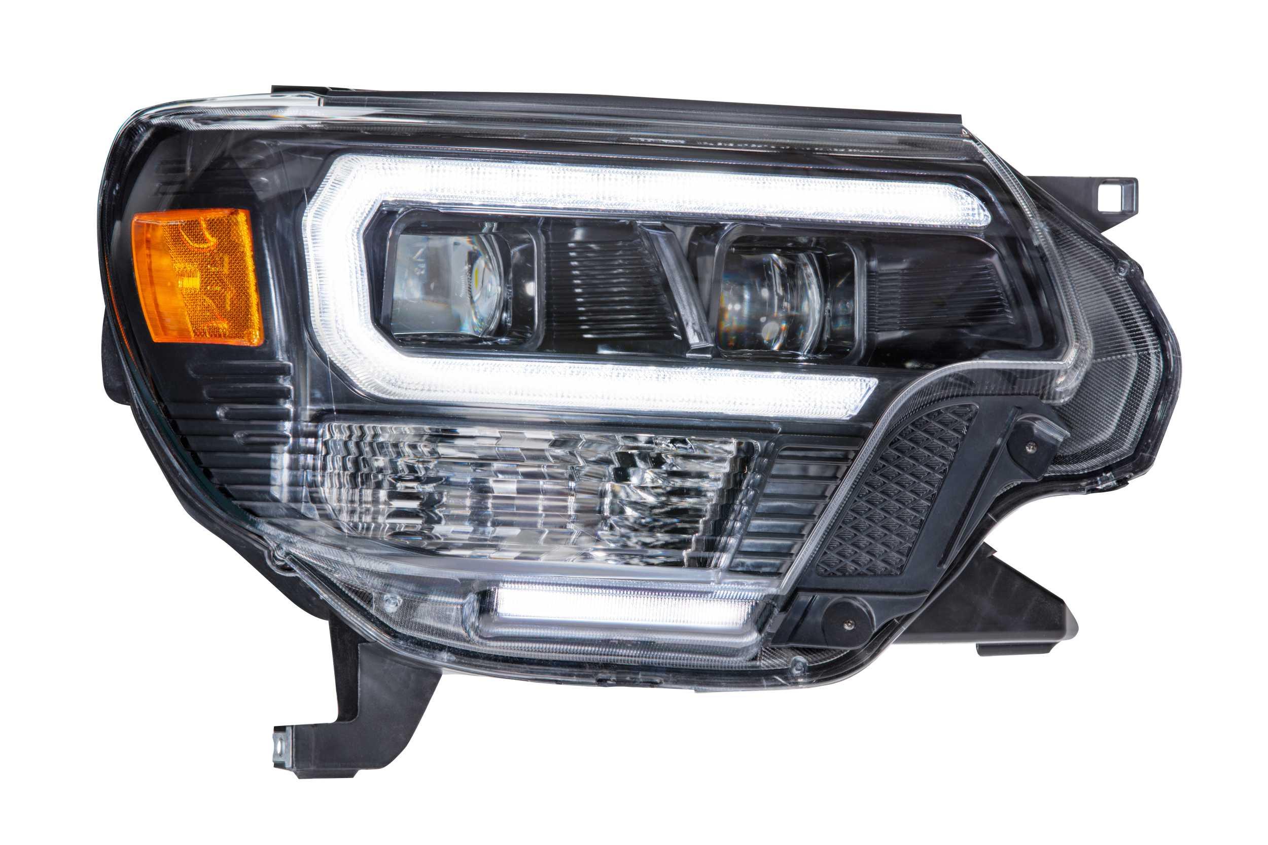 Toyota Tacoma XB hybrid LED headlight assembly with clear lens and amber reflector