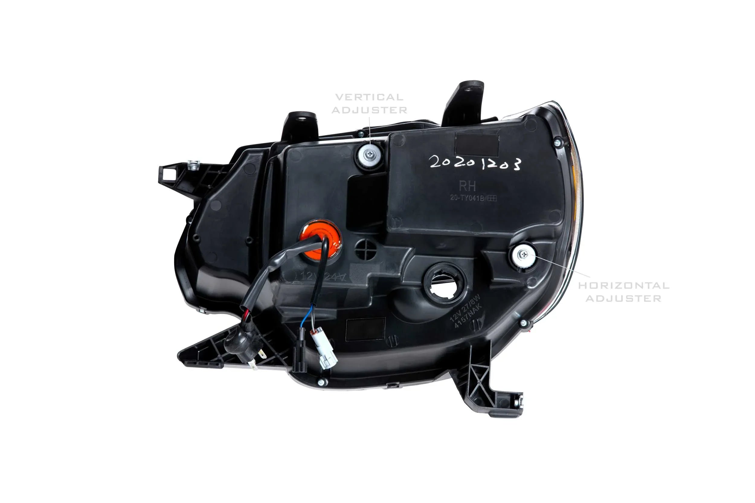 Rear view of Toyota Tacoma XB Hybrid headlight with wiring and adjusters visible