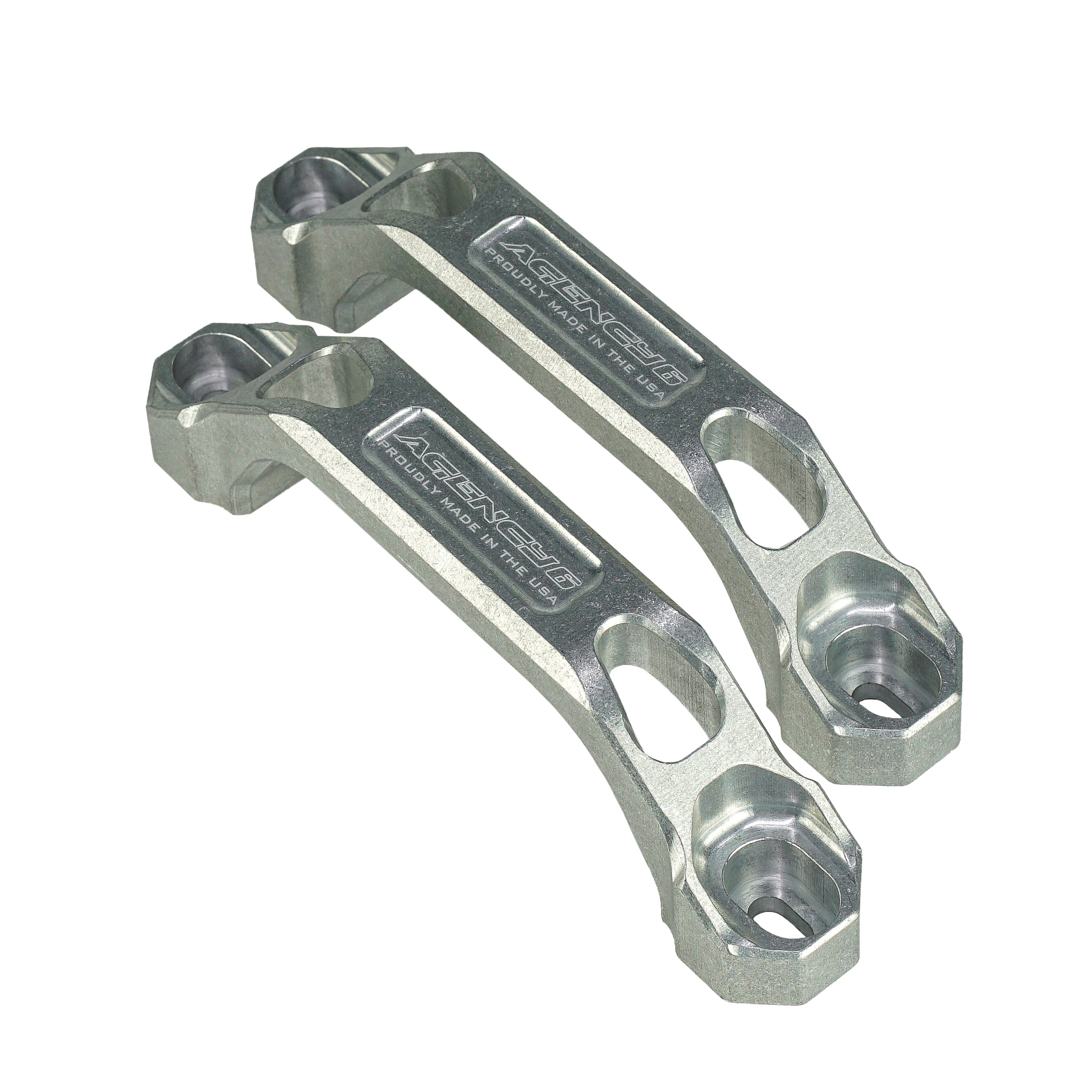 Pair of silver billet aluminum rear brake caliper brackets for off-road vehicles