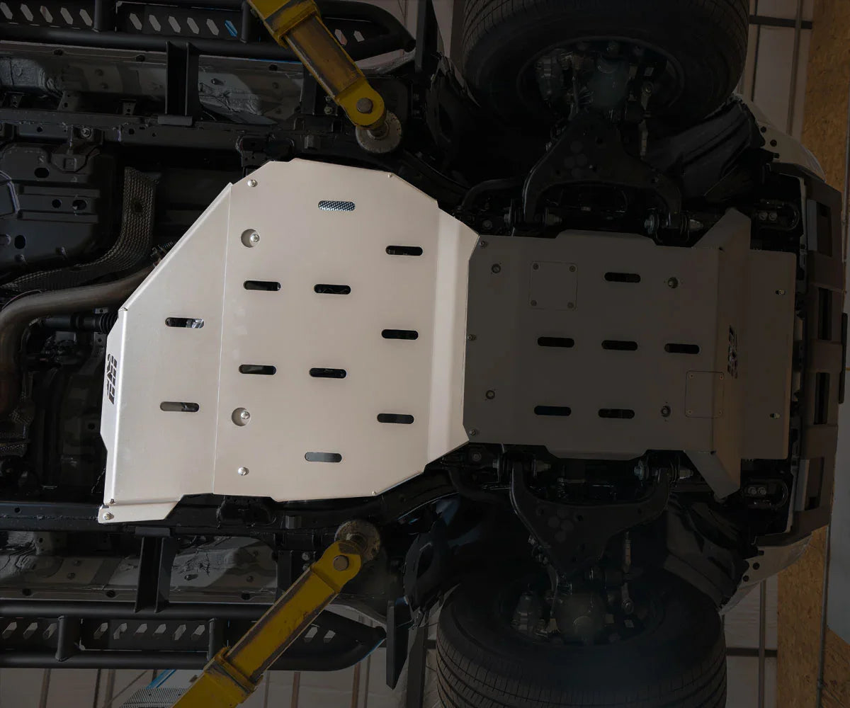Aluminum rear skid plate installed under Toyota 4Runner, overland vehicle protection