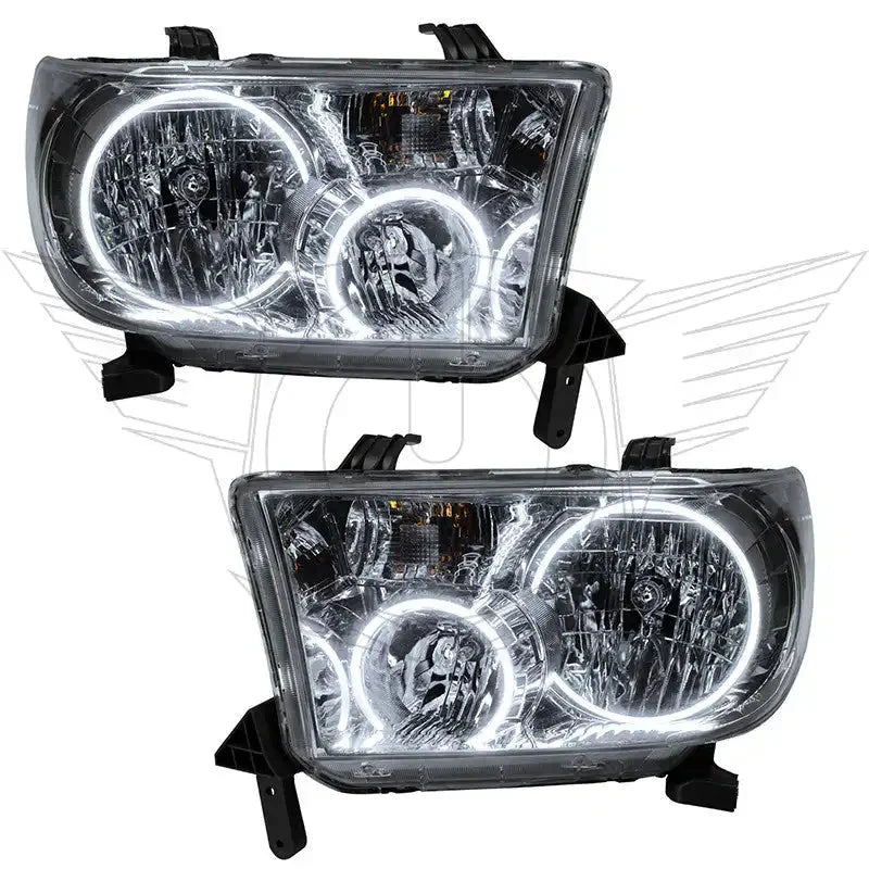 Pair of LED halo projector headlights for Toyota Tacoma, clear lens, black housing