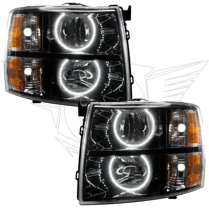 Pair of black projector headlights with LED halo rings for trucks or SUVs