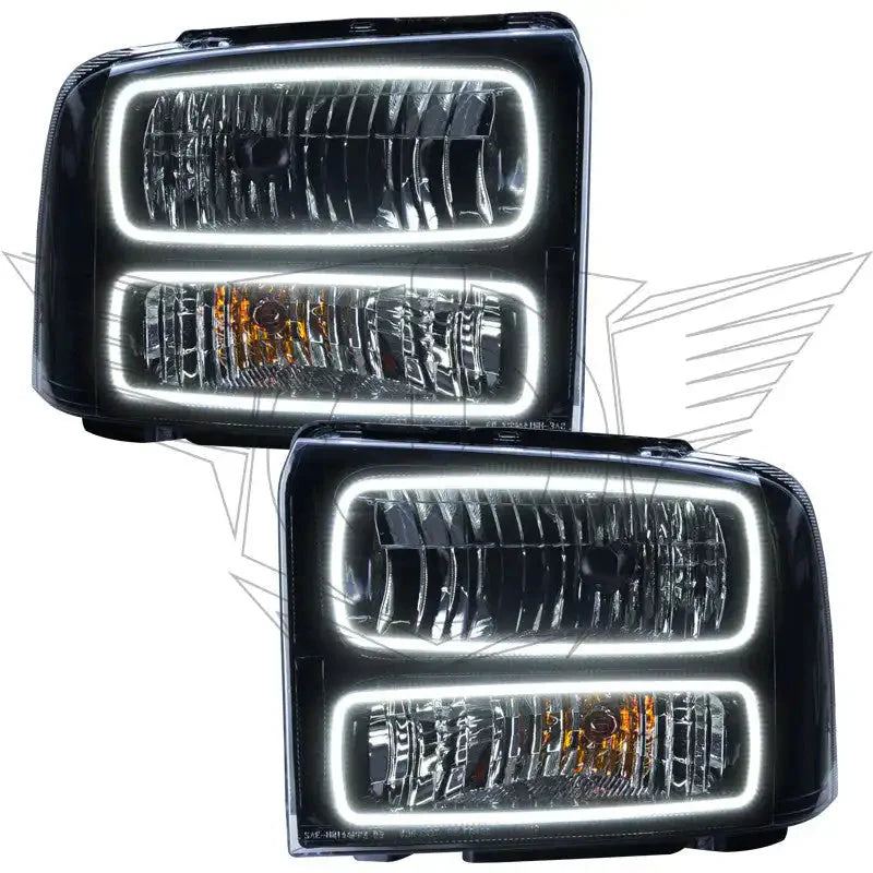 Pair of LED projector headlights with white halo DRL for Toyota Tacoma, clear lens, black housing