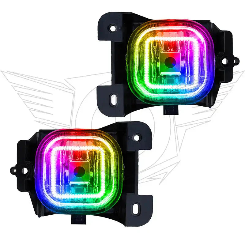 Pair of square LED RGB fog lights for off-road vehicles, showing vibrant multicolor glow.