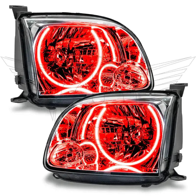 Pair of aftermarket projector headlights with red LED halo rings for Toyota Tacoma