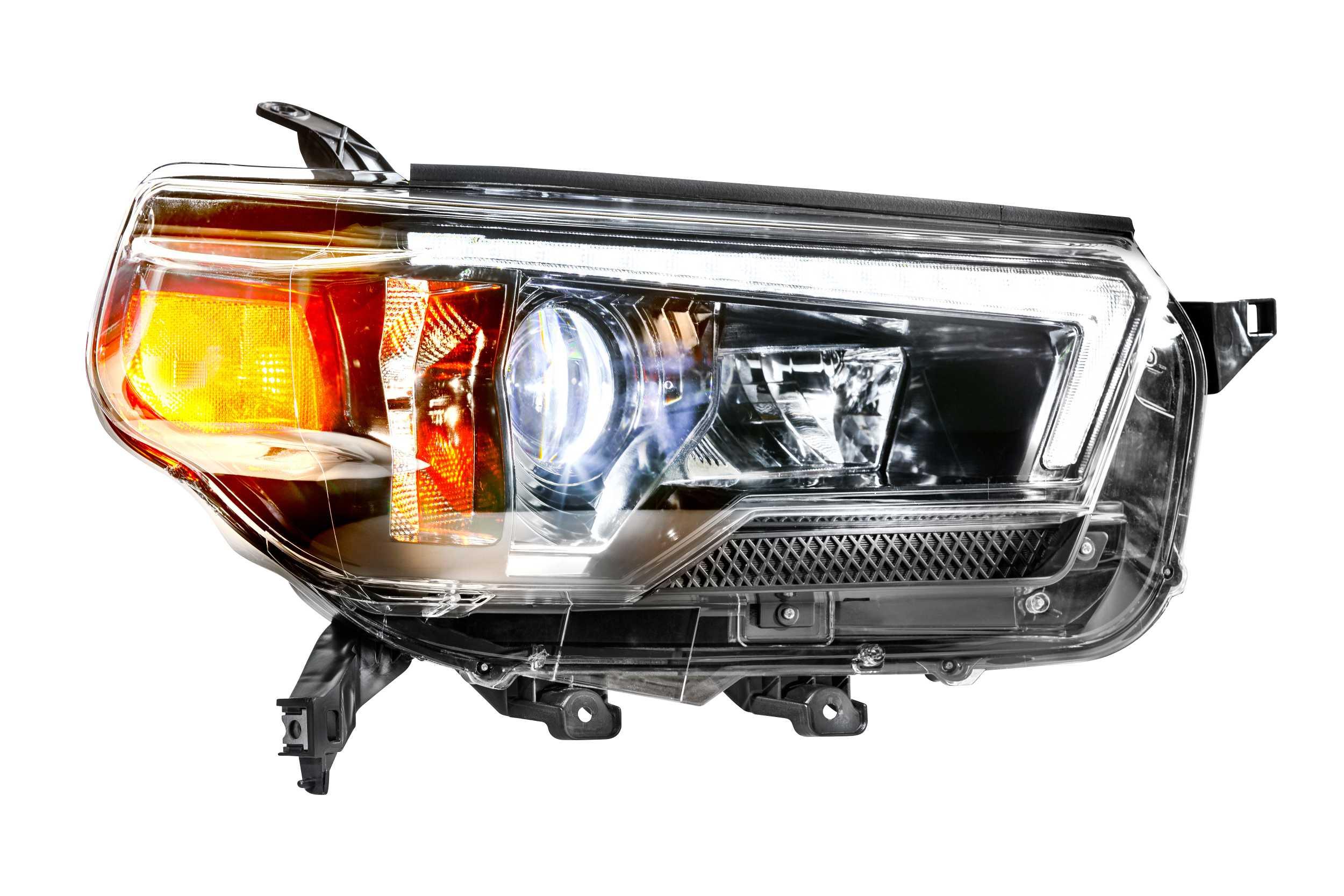Toyota Tacoma LED headlight assembly with amber turn signal and clear lens
