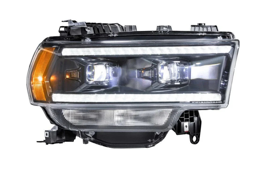 LED projector headlight assembly with amber reflector for Toyota Tacoma, isolated on white background