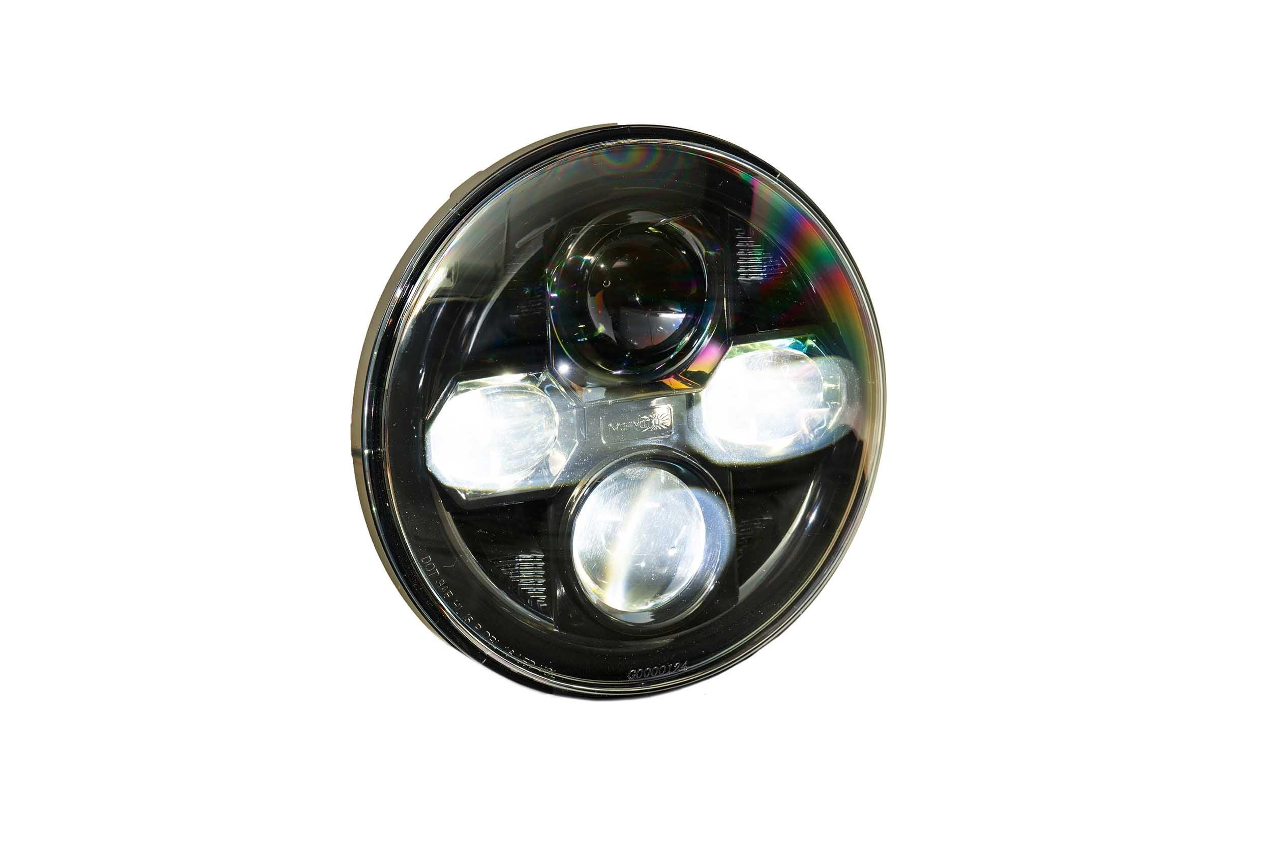 Round LED off-road headlight for Toyota and Jeep vehicles, clear lens, black housing