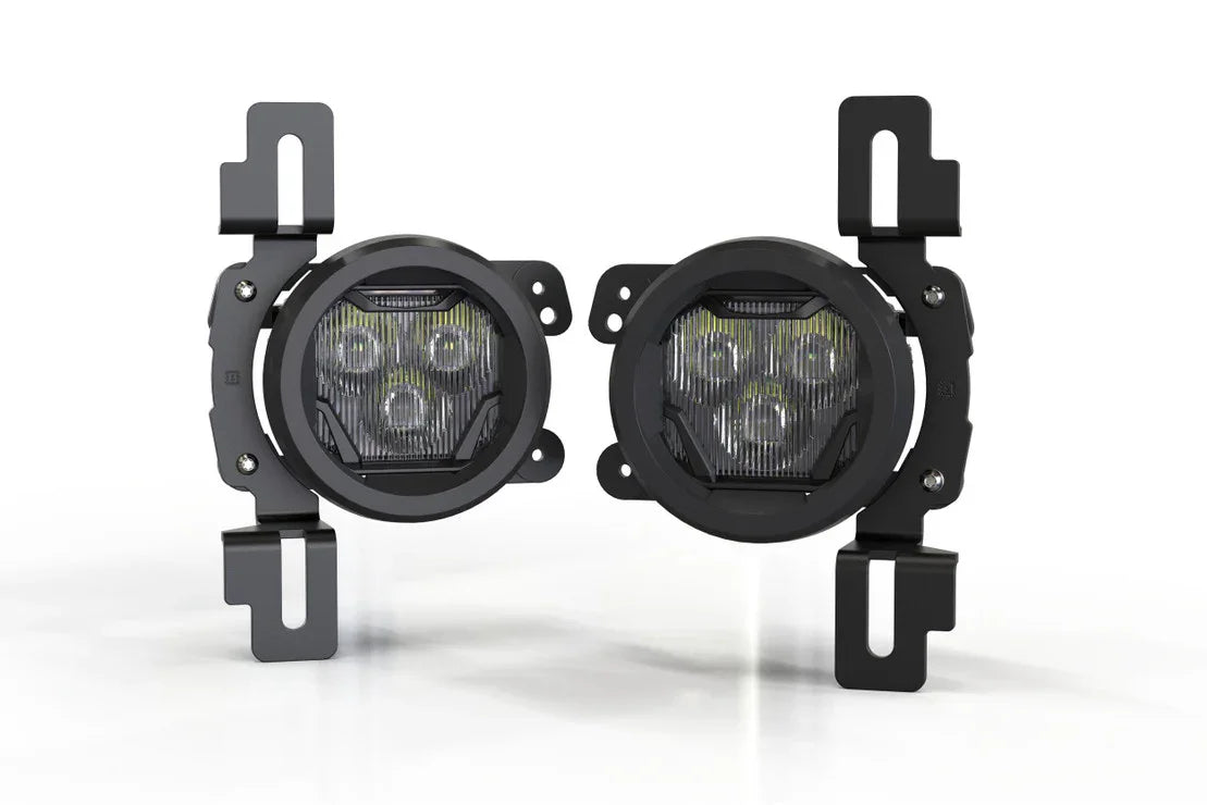 Pair of round LED fog lights with black mounting brackets for off-road vehicles