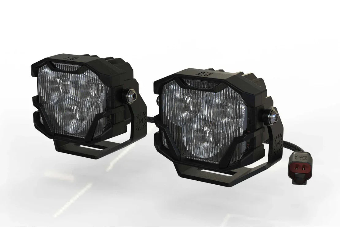 Pair of LED off-road pod lights with black housings and mounting brackets, isolated on white background