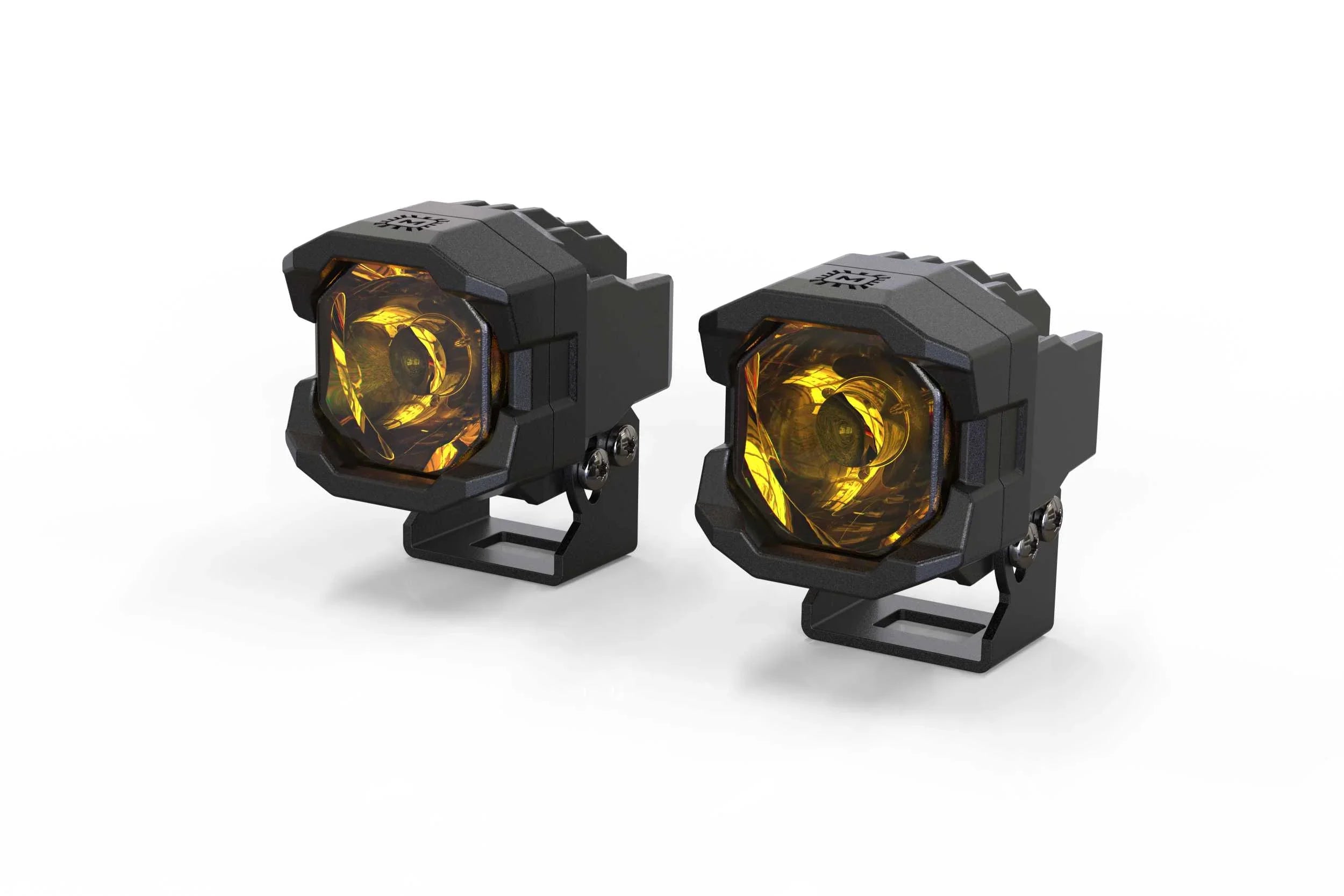Pair of yellow lens LED pod lights for off-road and overlanding vehicles on white background