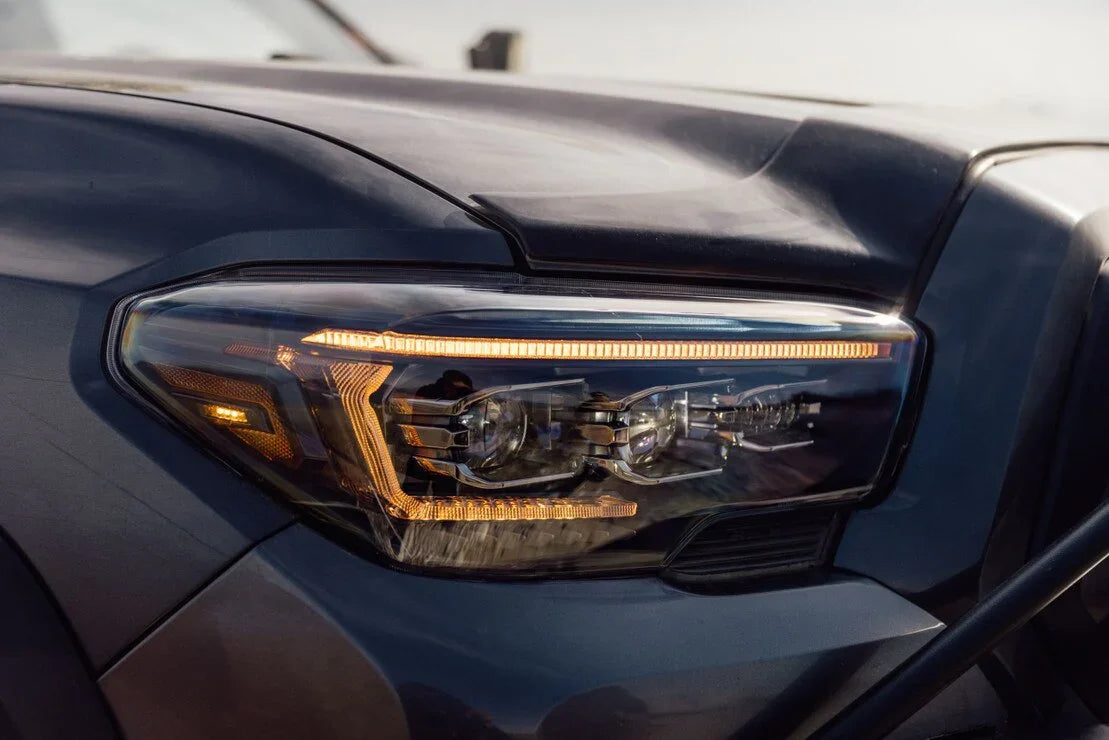 Close-up of LED projector headlight on a Toyota Tacoma truck