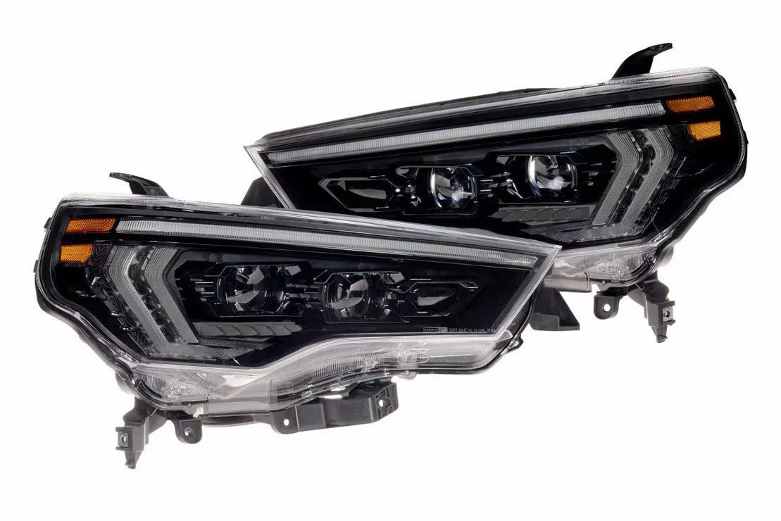 Pair of LED projector headlights for Toyota Tacoma, black housing, modern style, isolated view