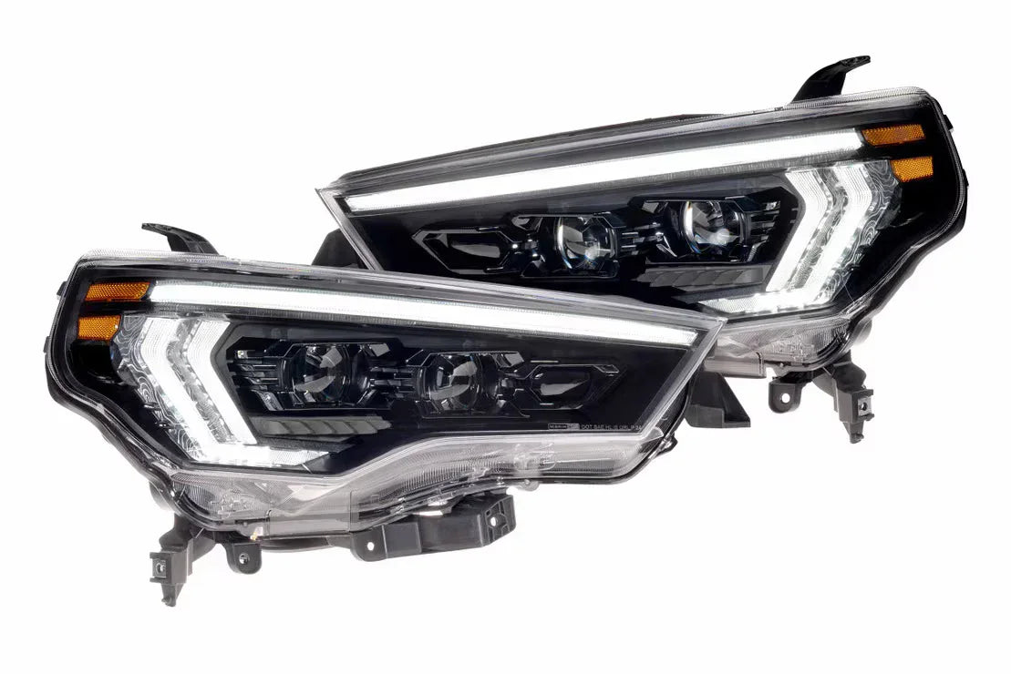 Pair of modern LED projector headlights with amber accents for Toyota Tacoma