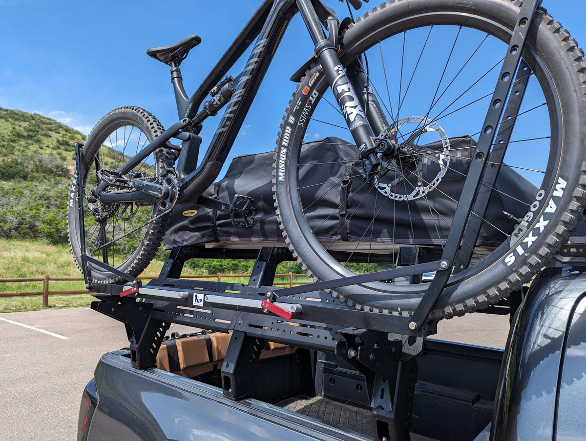 upTOP Overland Bike Base with bikes on bed rack