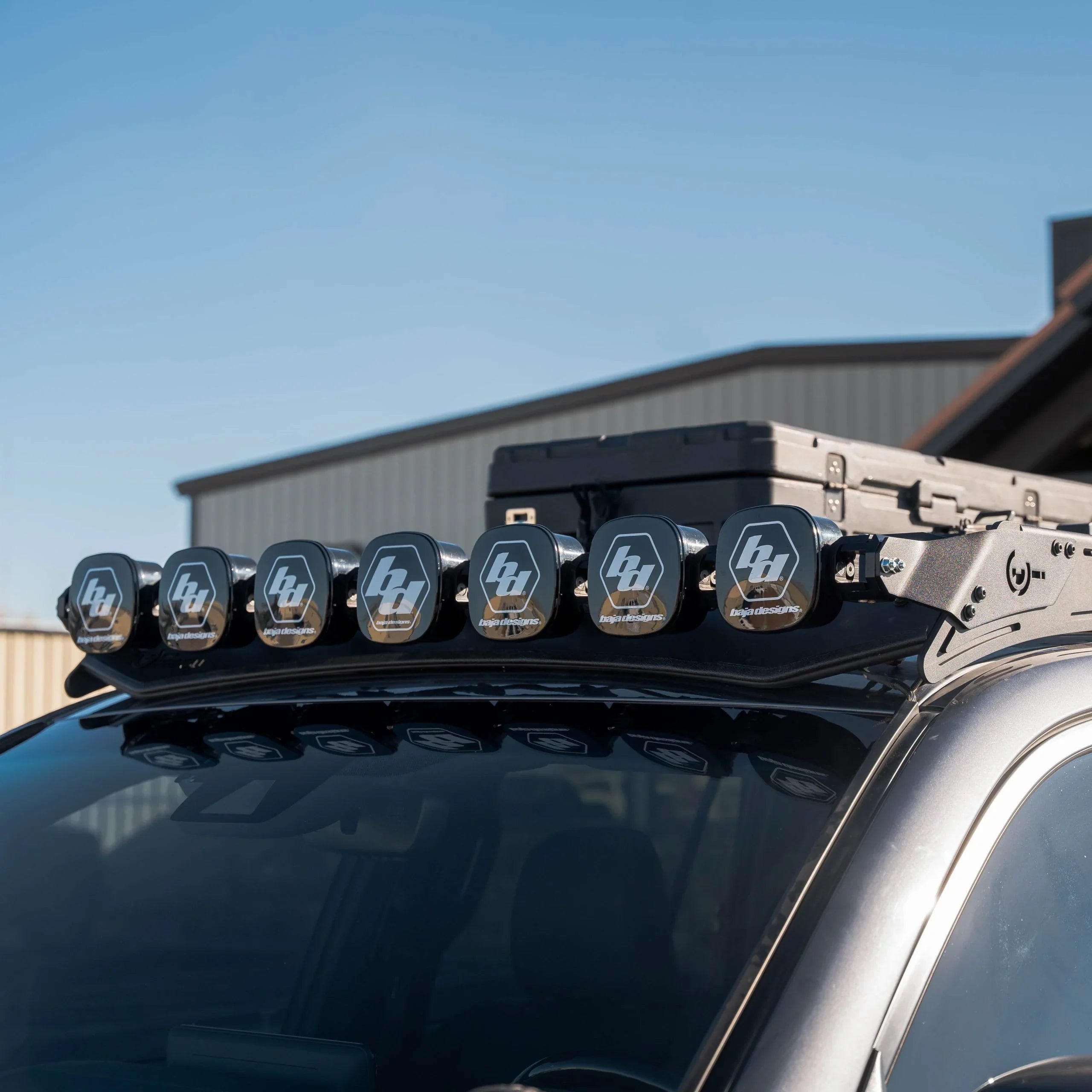 Roof rack with off-road LED light bar mounted on an overlanding vehicle