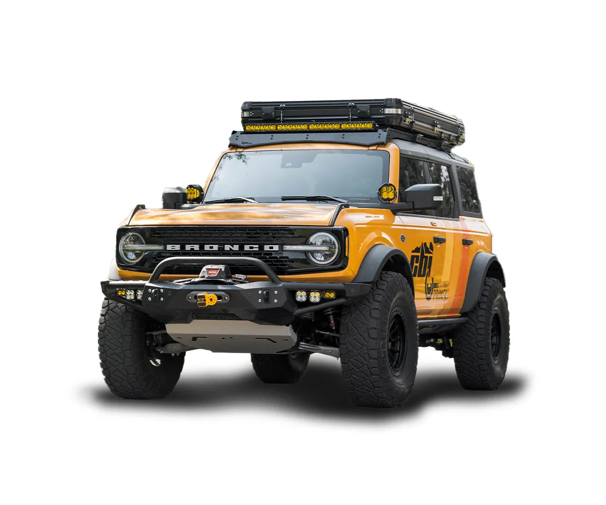 Ford Bronco overlanding SUV with off-road accessories, roof rack, and rugged tires