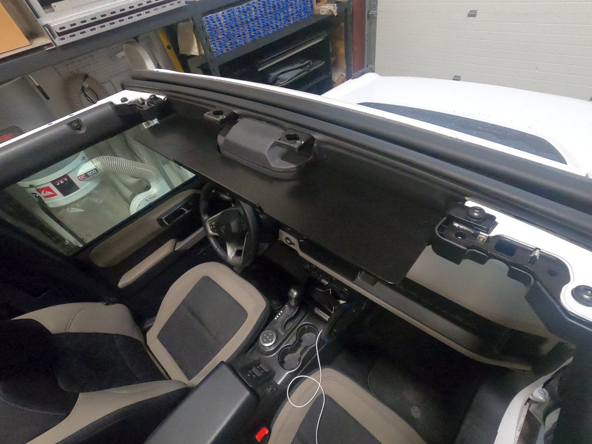 Diabolical Inc Visor Shelf installed in a Ford Bronco