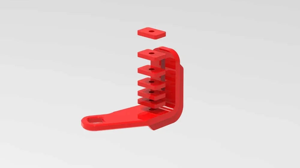 Red metal vehicle mounting bracket kit with stacked components for off-road accessories
