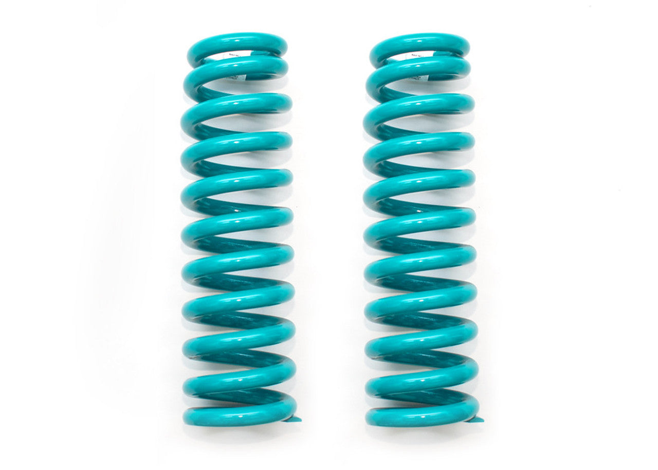 Pair of teal heavy-duty suspension coil springs for off-road vehicle upgrades