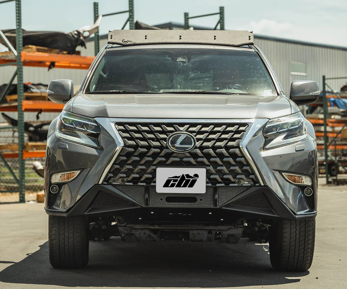 Front view of Lexus GX460 with covert off-road bumper, parked in outdoor storage area
