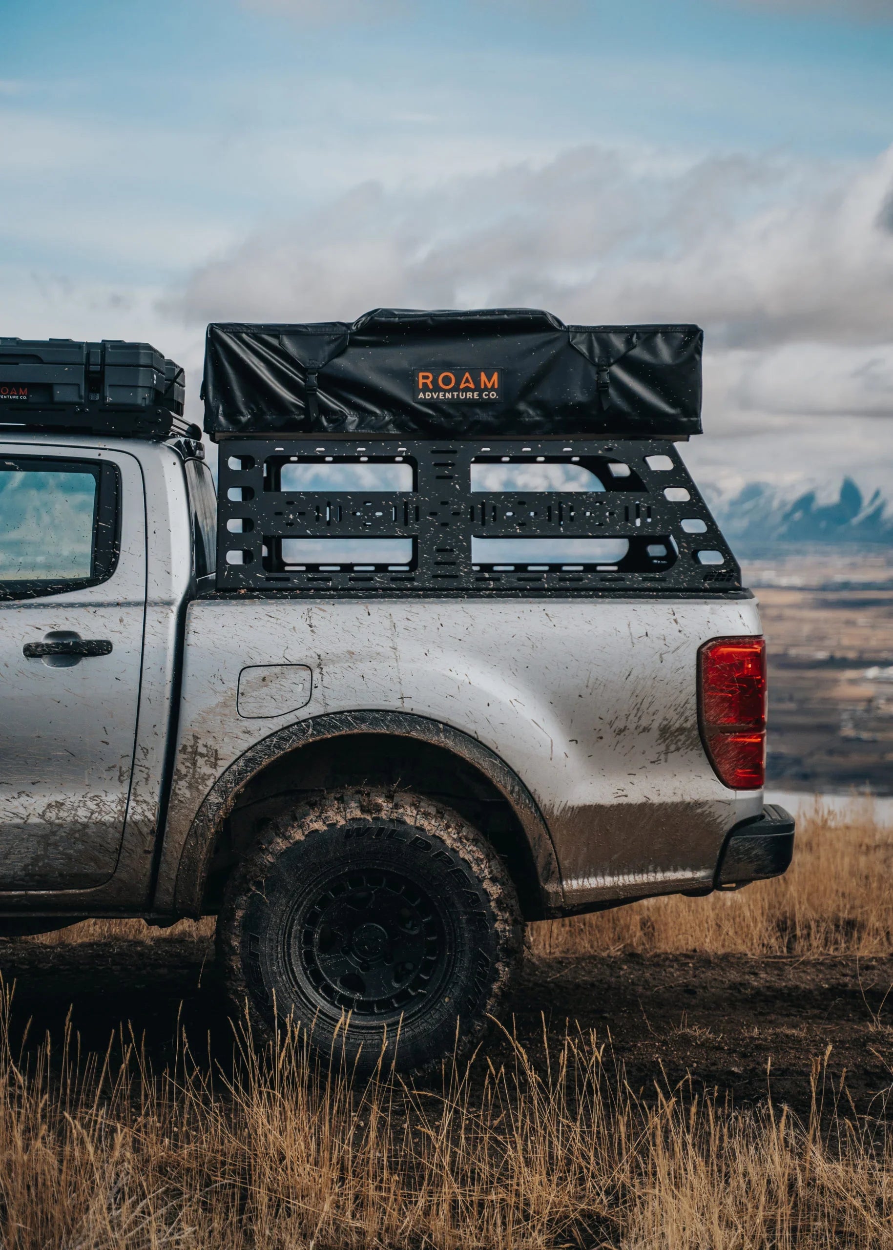 Ford Ranger with cab height bed rack and rooftop tent for overlanding outdoors